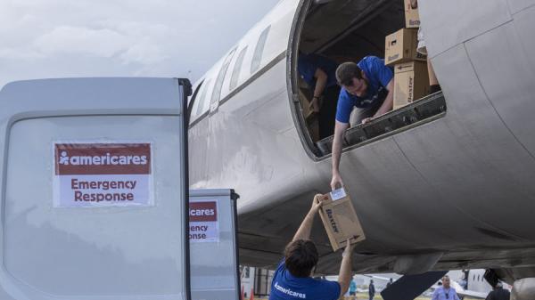 Baxter-donated products arriving in Puerto Rico with Americares Emergency Response Flight. Photo Credit: Alejandro Granadillo/Americares.
